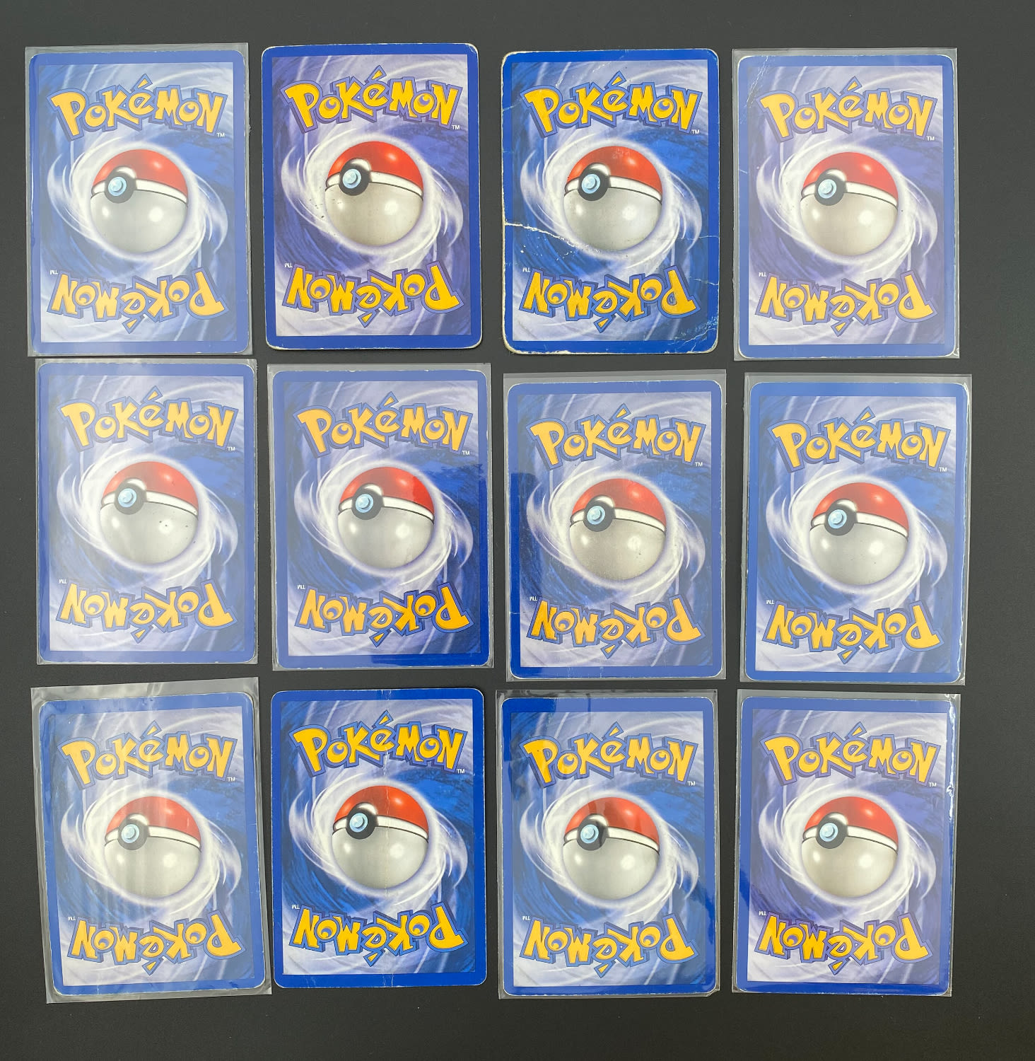 קלפי איסוף - לוט 12 קלפי פוקימון באנגלית - Rare + Holo Rare - Used - מהסט Team Rocket.
פוקימון (באנגלית: ... - 1 1
