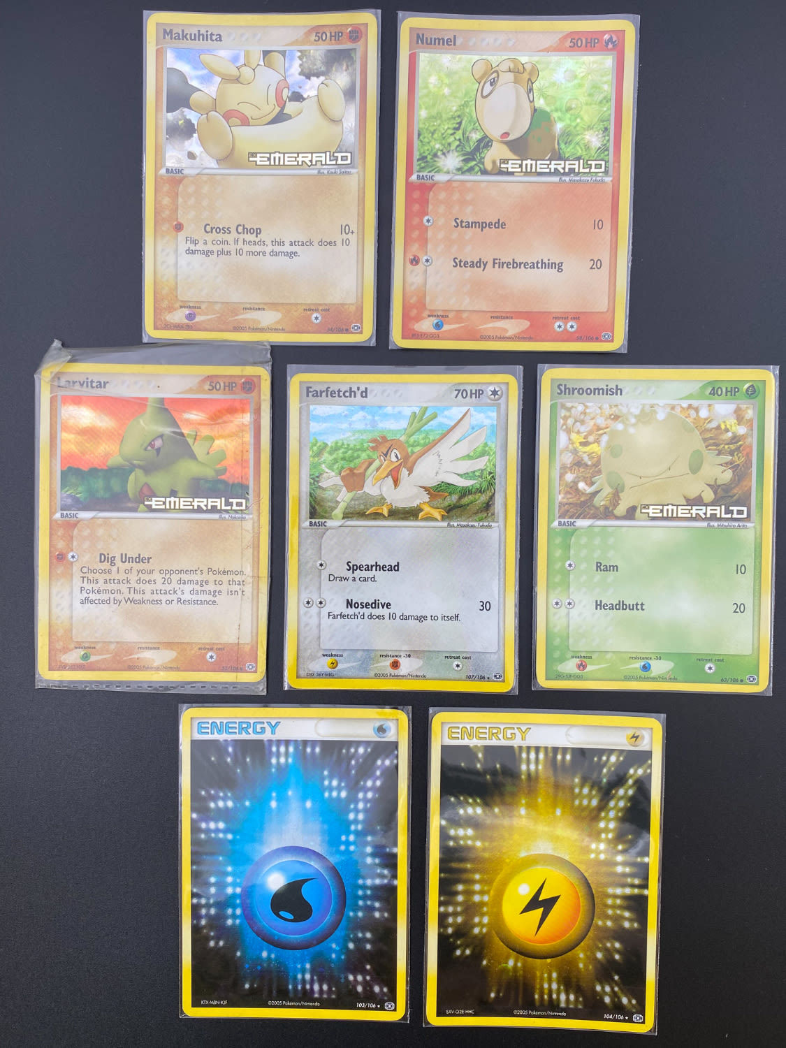 קלפי איסוף - לוט 7 קלפי פוקימון - NM-LP - Holo - מהסט EX Emerald + הקלף Machamp lv. X מהסט ... - 1 1