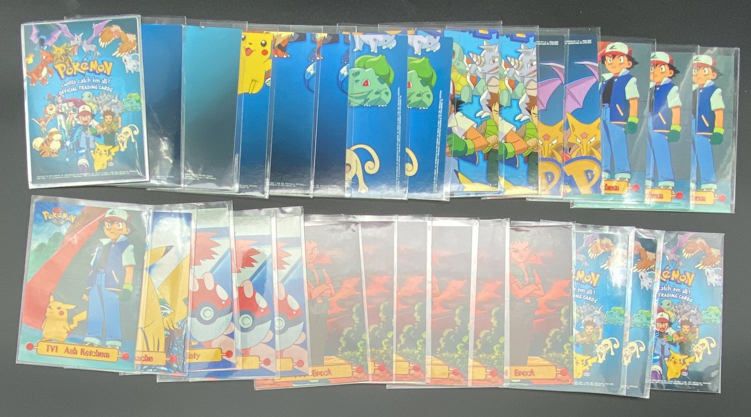 קלפי איסוף - Topps - לוט של כ-30 קלפי פוקימון של הסט Pokémon Trading Cards series 1 - Character cards + Checklist - ... - 1 0