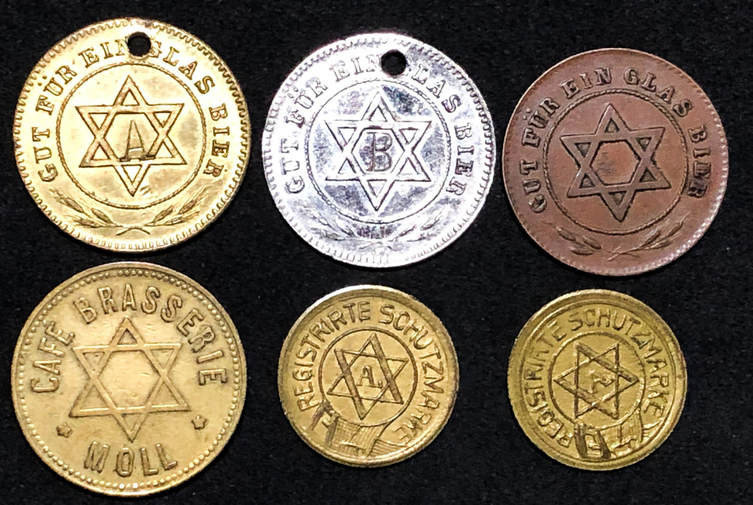Lot Europinian tokens with Star of David on them.