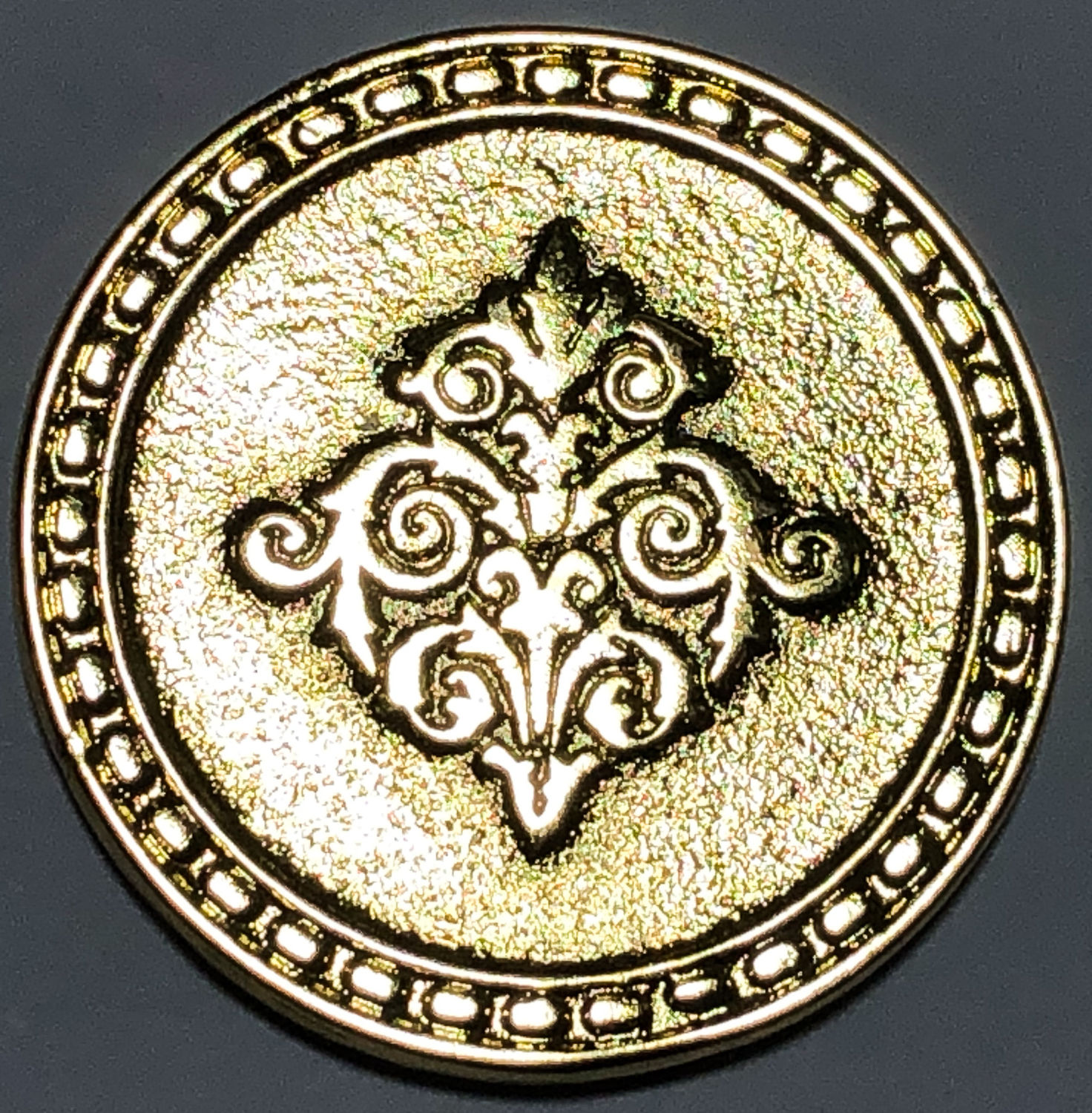 A token for success.
Front: The circumference of the token is decorated, and on the upper ... - 1 2