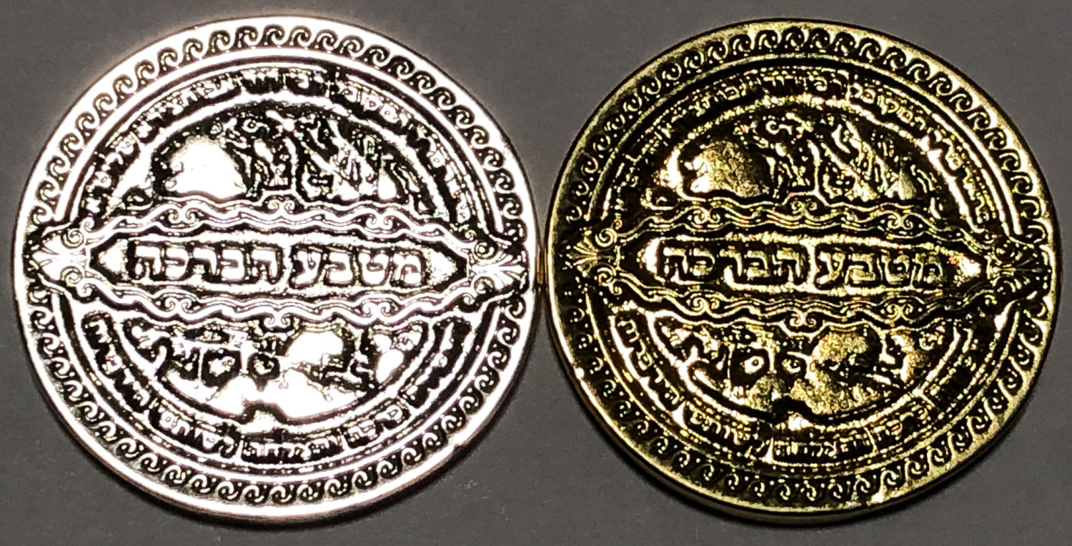 2 blessing tokens decorated with different coatings.