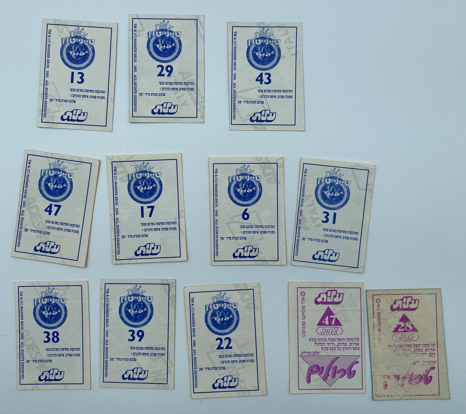 מדבקות - מקבץ 12 מדבקות אשר היו מצורפות למסטיקים של חברת "עלית" - דמויות מסדרת "טייני טון" ... - 1 1