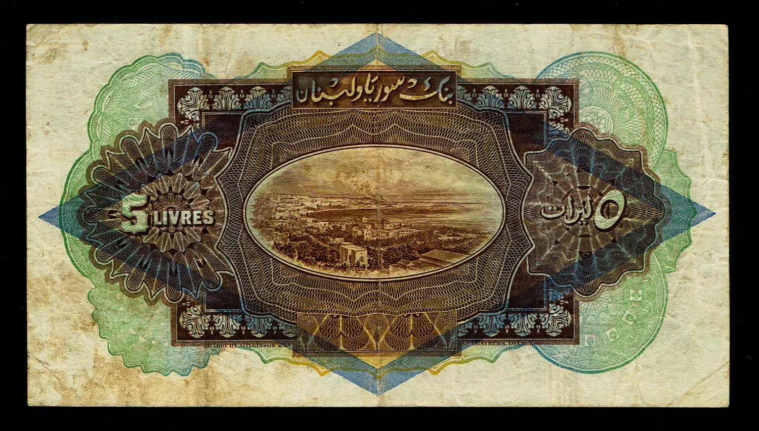 Syria - 5 Livres 1939 - VF
Obverse
Cedar tree at left
Lettering:
SYRIE ... - 1 1