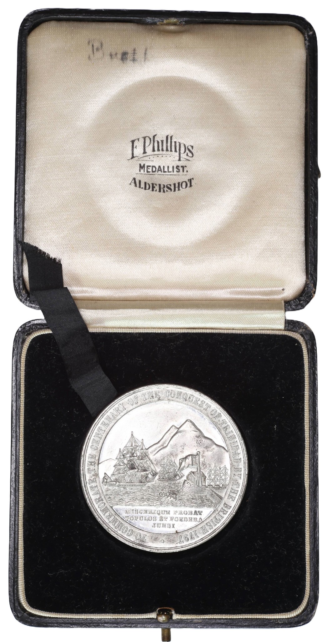 White Metal (Tin?) Medal Commemorating the Centenary of the Conquest of Trinidad by the British in 1797. Uniformed ... - 1 1