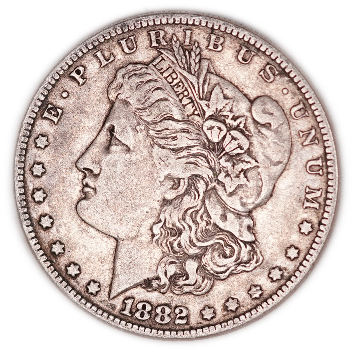 United States - 1882 Morgan $1 - .900 Silver, 26.71 g Gross Weight (24.04 g Net Silver, 0.7729 Troy Ounce) - F-XF - ...